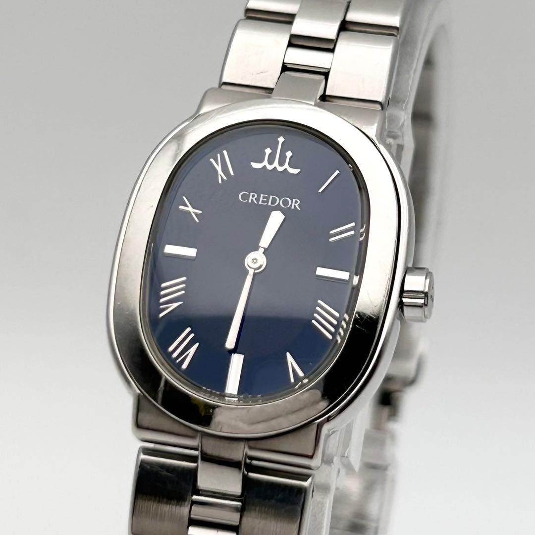 S E I K O C R E D O R Aqua 5A70-0AC0 Ladies Oval Quartz Watch Navy Dial