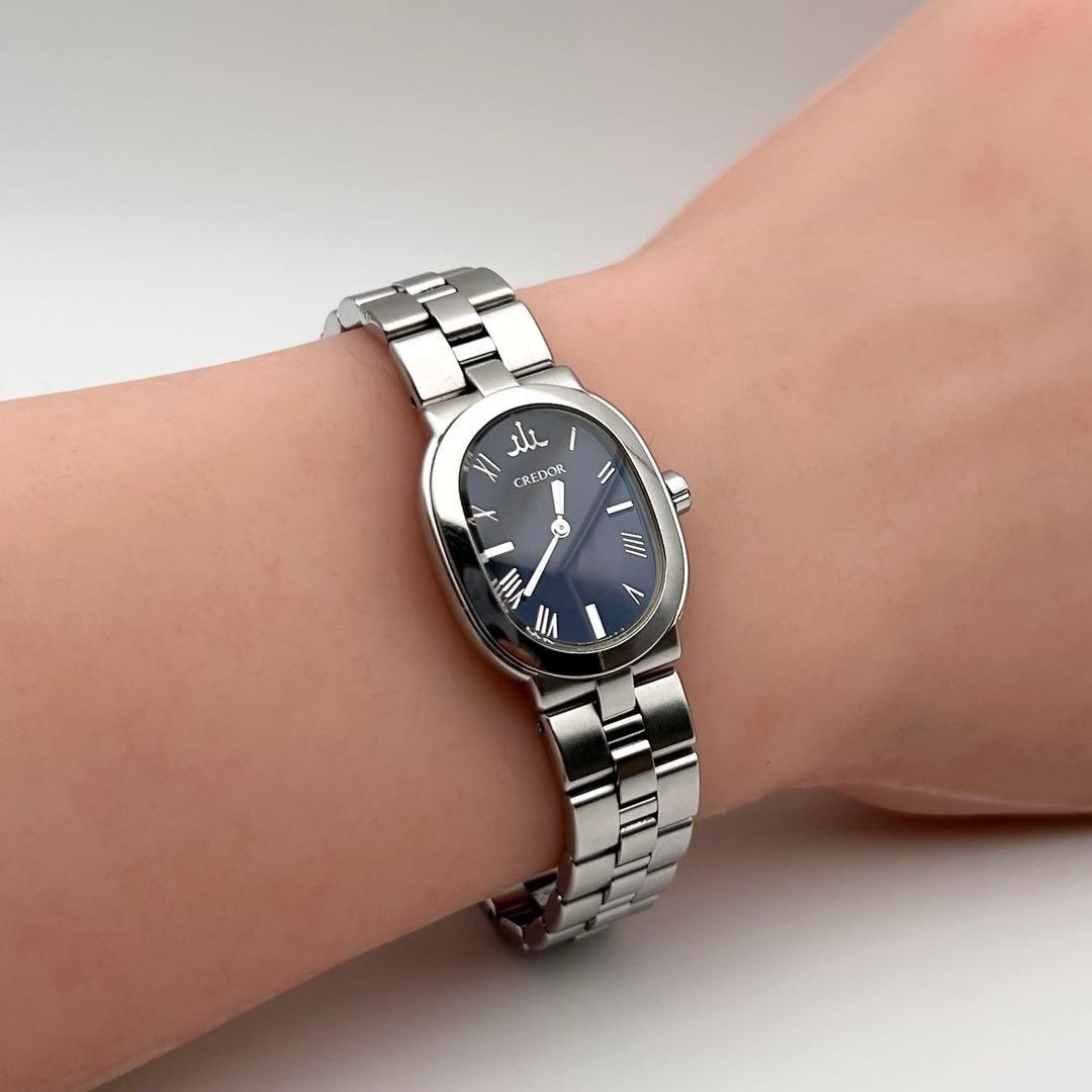 S E I K O C R E D O R Aqua 5A70-0AC0 Ladies Oval Quartz Watch Navy Dial