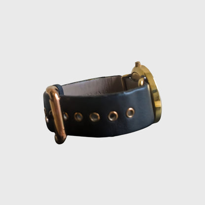 2000s MBM1154 Gold Accent Black Leather Watch